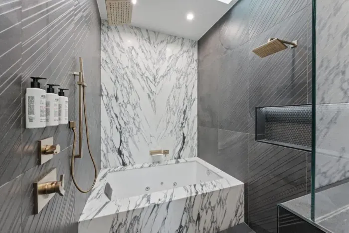 Unwind in our spacious bathroom with modern amenities full of luxury