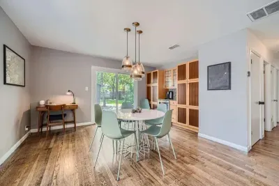 A spacious dining area where everyone can come together to eat and connect.