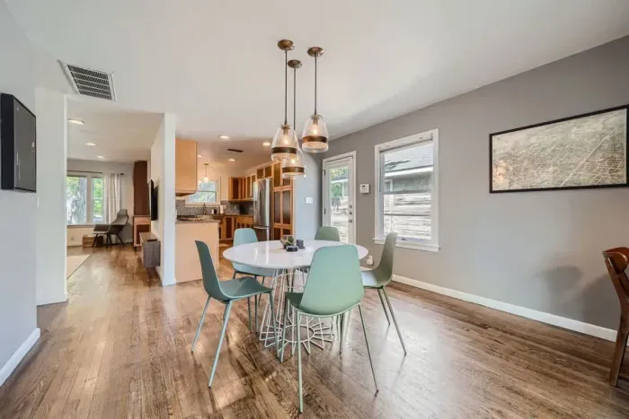 The open-concept dining area flows seamlessly from the kitchen, making group meals a breeze.