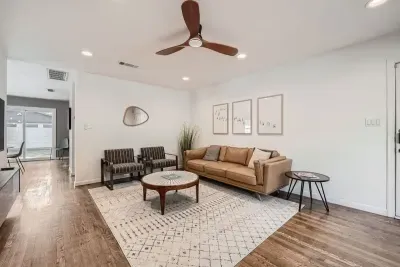 Equipped with a large TV, cozy seating, and space for everyone