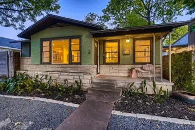 Beautifully landscaped garden surrounding a stylish, contemporary home.