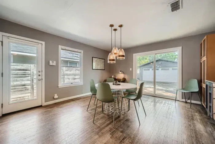 Sleek and modern dining area with minimalist decor and a welcoming atmosphere.