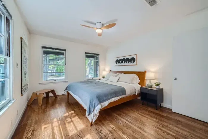 Peaceful bedroom with a plush queen-sized bed and soft linens for a restful night’s sleep.