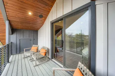 Private balcony with outdoor seating.