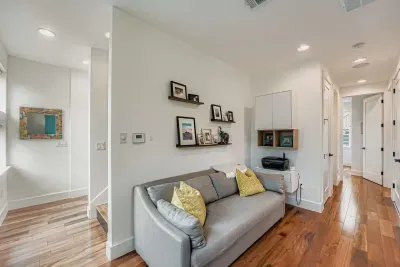 Hallway lounge area with seating.