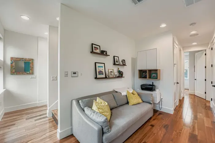 Hallway lounge area with seating.