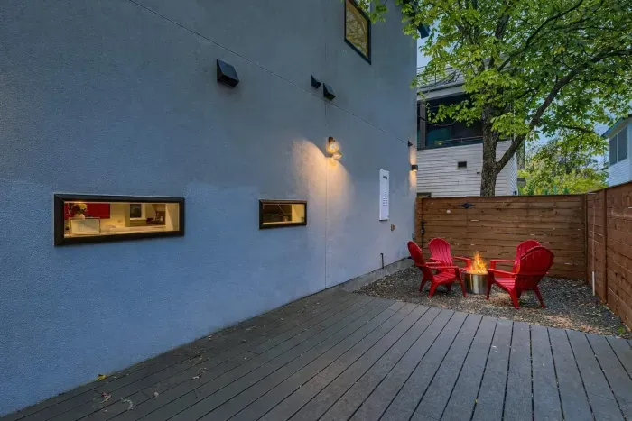 Private backyard with outdoor seating.