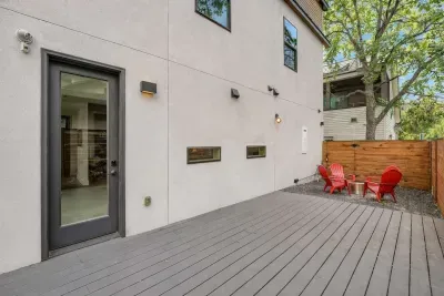 Private back deck with seating area.