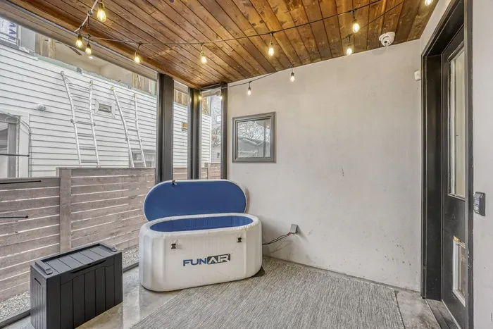 Cold plunge tub and hot tub wellness area.