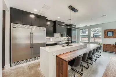 Fully equipped kitchen with stainless appliances.