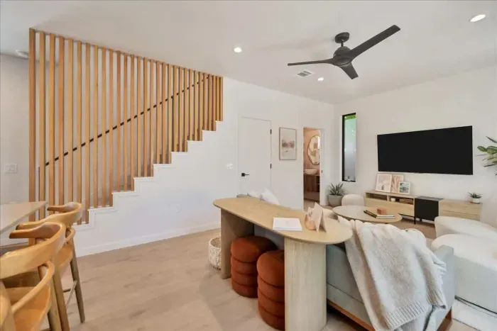 Kick back in a cozy living room with plenty of seating for everyone.