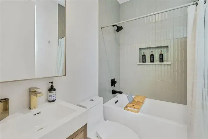 Take a relaxing soak in the tub—perfect after a long day on the go.