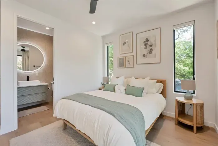 Rejuvenate with a good night's sleep in a spacious, serene bedroom.