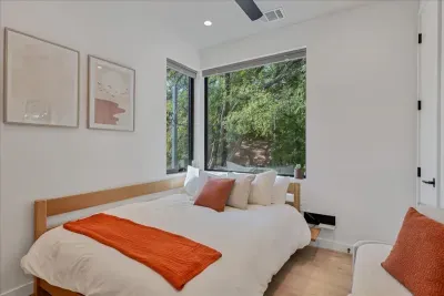 Wake up refreshed in a bedroom filled with natural light and peaceful vibes.