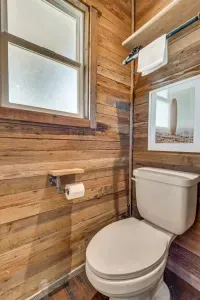 Fresh and stylish bathroom with a large vanity and natural light.