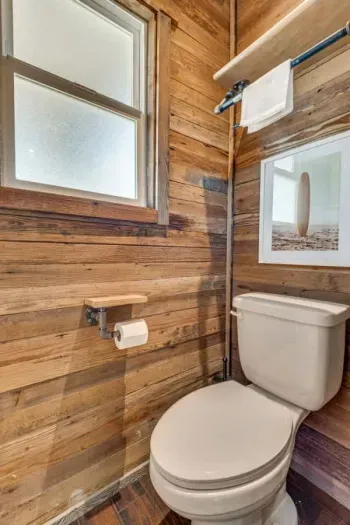 Fresh and stylish bathroom with a large vanity and natural light.