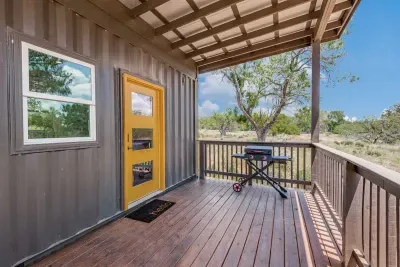 Cozy patio with comfortable seating and a peaceful atmosphere, perfect for morning coffee or evening relaxation.