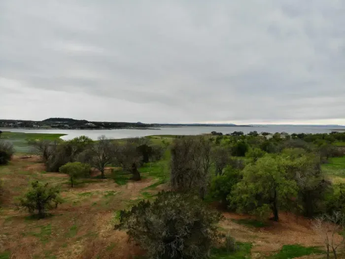 20 Wooded Acres on the water