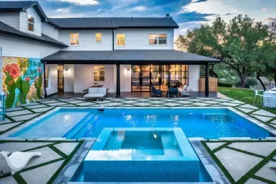 4. Your private slice of paradise featuring a resort-style heated pool with glowing sunset views.