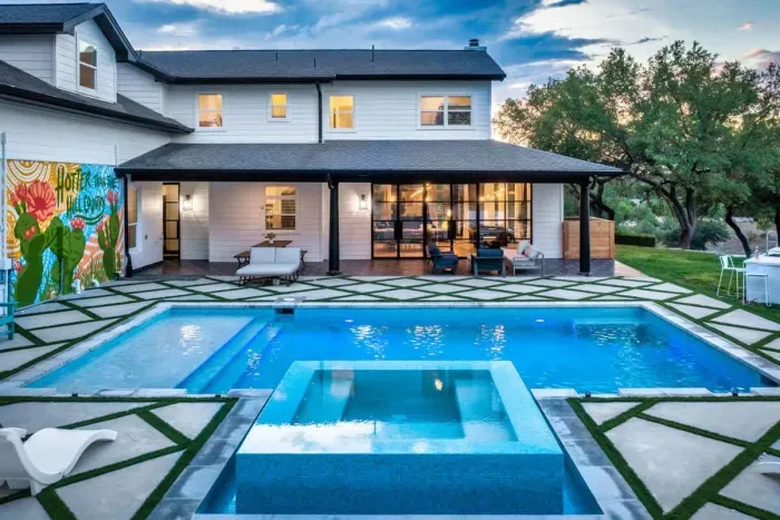 4. Your private slice of paradise featuring a resort-style heated pool with glowing sunset views.