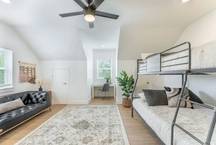 A serene and thoughtfully furnished bedroom crafted for restorative rest.