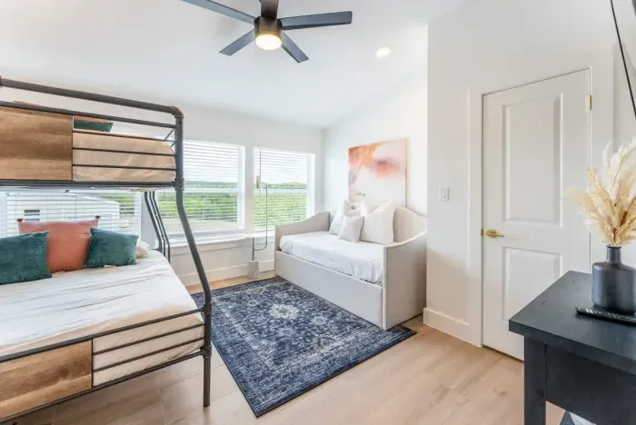 A bright and inviting bedroom designed for comfort and style.