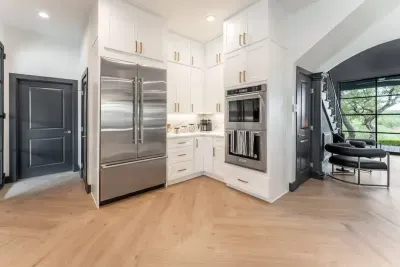 Stainless steel fixtures and ample storage in this chef’s kitchen.