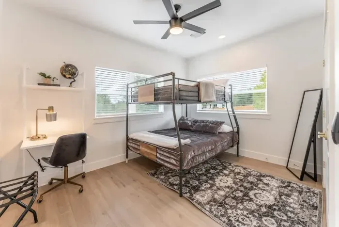 Serene bedroom with calming colors and thoughtfully chosen furnishings.