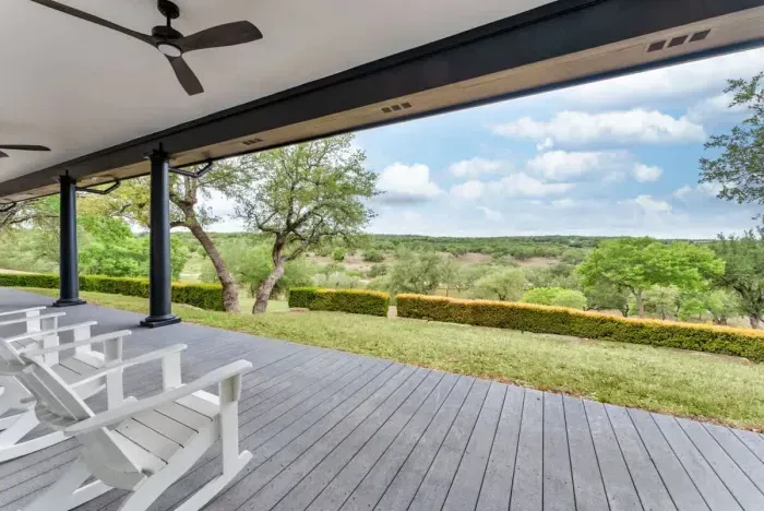 A private front porch with timeless elegance and inviting ambiance.