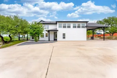 A private front porch with timeless elegance and inviting ambiance.