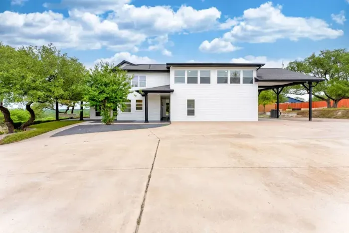 A private front porch with timeless elegance and inviting ambiance.
