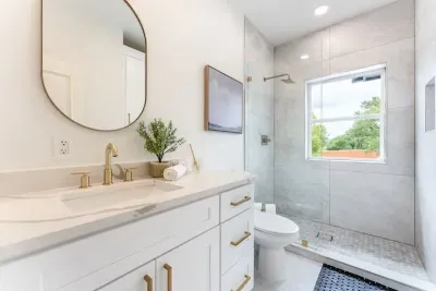 A sparkling bathroom curated with luxurious finishes and meticulous detail.
