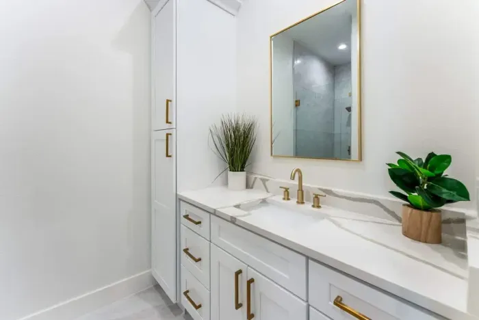 Refresh in a beautifully designed bathroom with luxury fixtures and soft illumination.