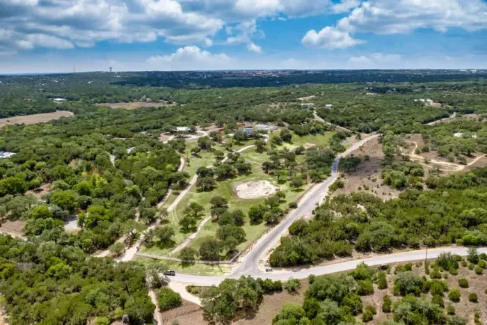 A breathtaking aerial view capturing the full beauty of the estate and natural surroundings.