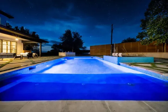 Evening pool view perfect for cannonballs and nighttime swims.