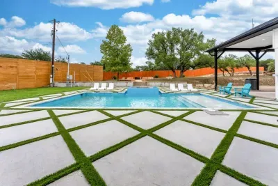 Your private slice of paradise with a sparkling pool and lush surroundings.
