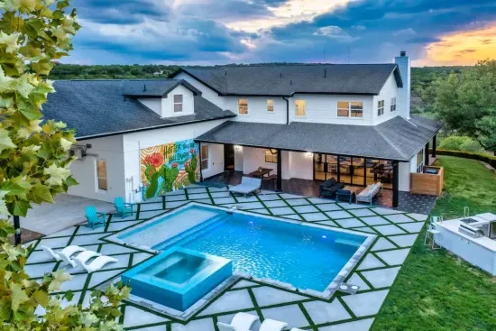 1. A breathtaking view of the entire retreat showcasing the home and luxury outdoor space.