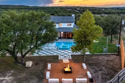 Admire the perfect blend of modern style and outdoor tranquility overlooking the sparkling pool.