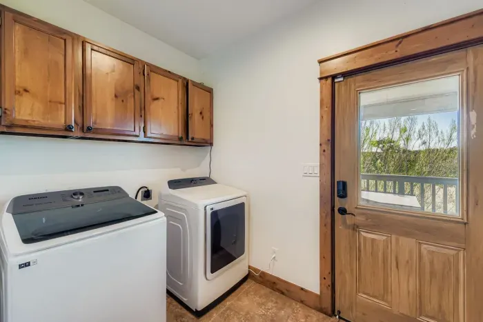 Laundry room with washer and dryer.
