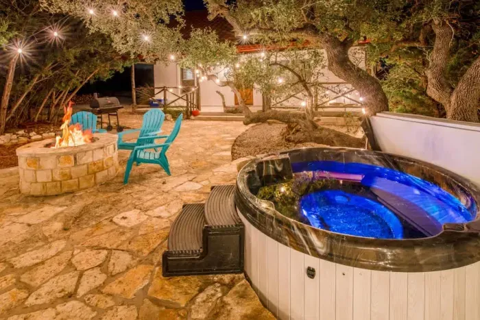 Backyard paradise with a hot tub, perfect for unwinding after a long day.