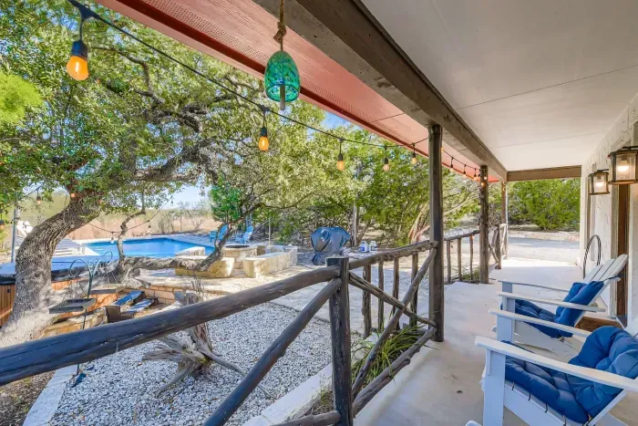 Patio seating overlooking the pool.