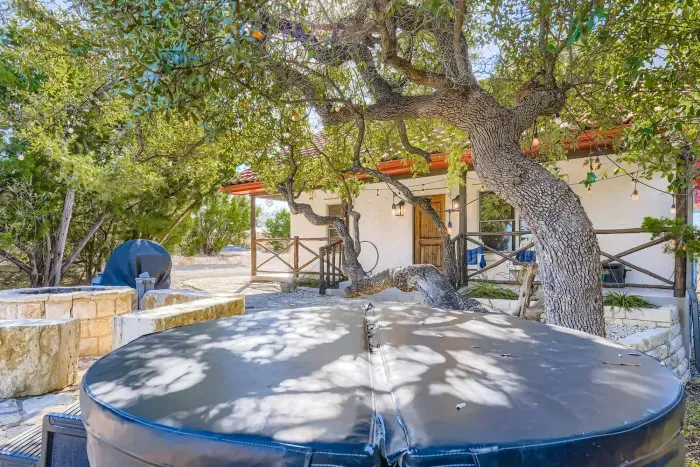 Private hot tub surrounded by nature.