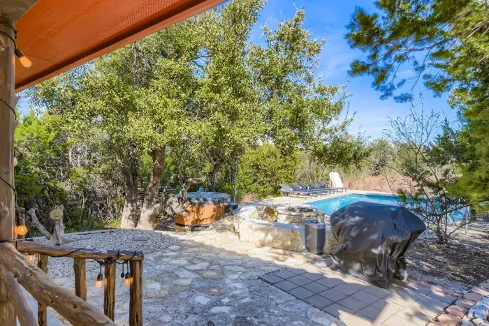 Poolside patio with grill area.