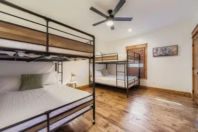 Primary bedroom with bunk setup.