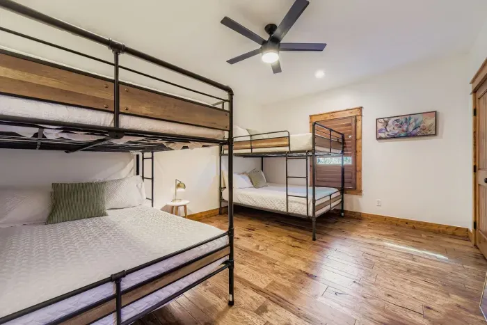 Primary bedroom with bunk setup.