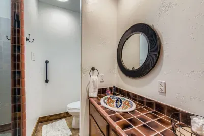 Full bathroom with walk in shower.