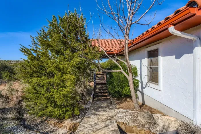 Private backyard with mature trees.