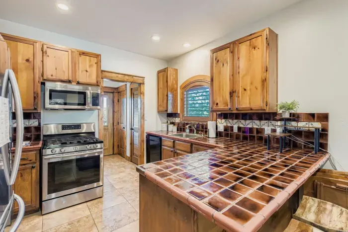 Kitchen with breakfast bar.