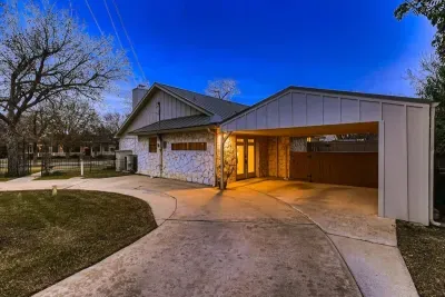 Multiple vehicles can fit in the driveway or under the carport. Enter through the back door conveniently located off the driveway and use your unique door code!