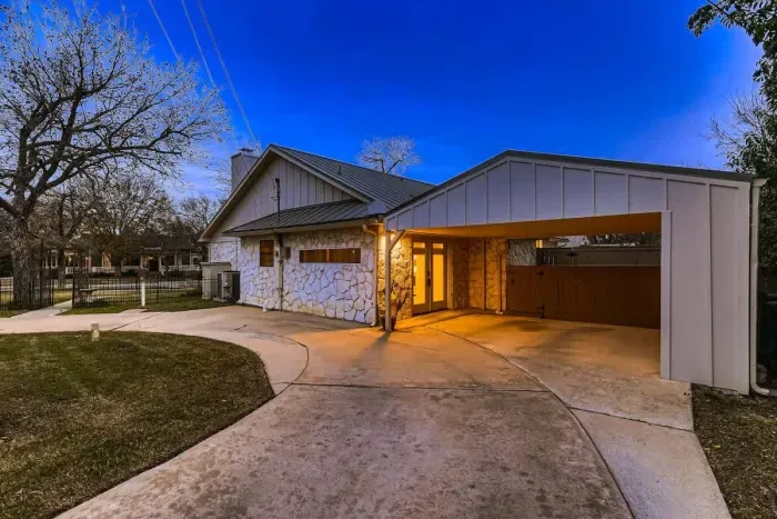 Multiple vehicles can fit in the driveway or under the carport. Enter through the back door conveniently located off the driveway and use your unique door code!